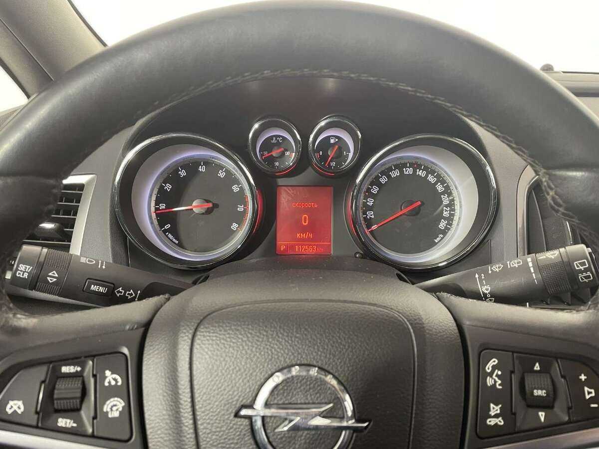 Б/У Опель Астра 2013 года. Фото: #10