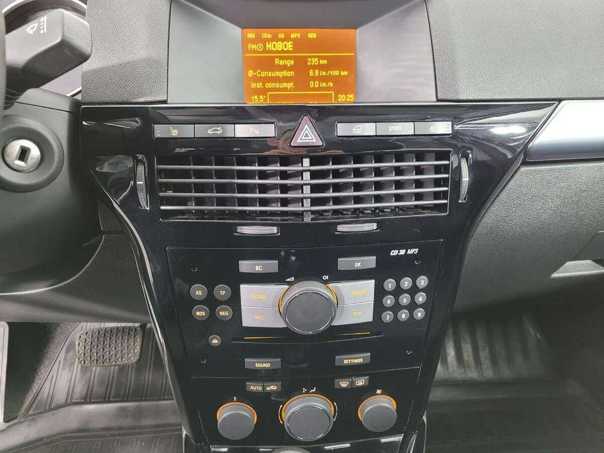 Б/У Опель Астра 2012 года. Фото: #11