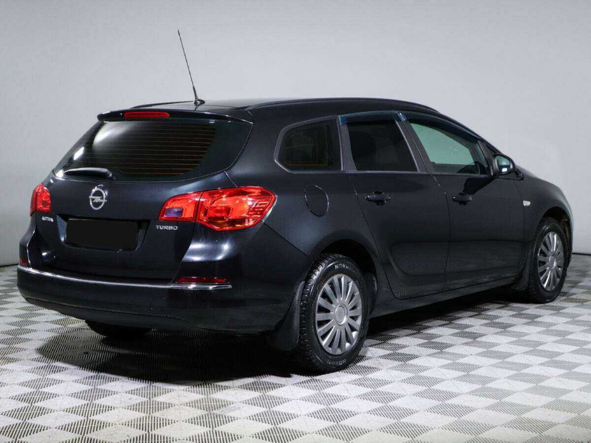 Б/У Опель Астра 2014 года. Фото: #4