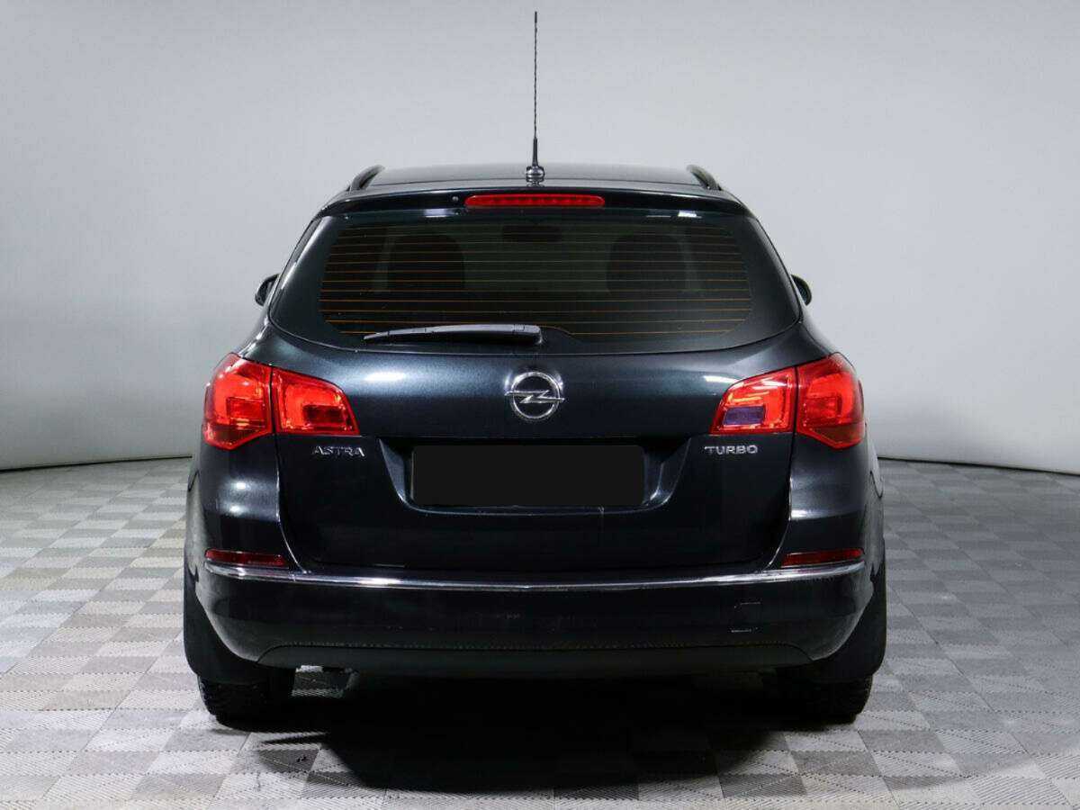 Б/У Опель Астра 2014 года. Фото: #5