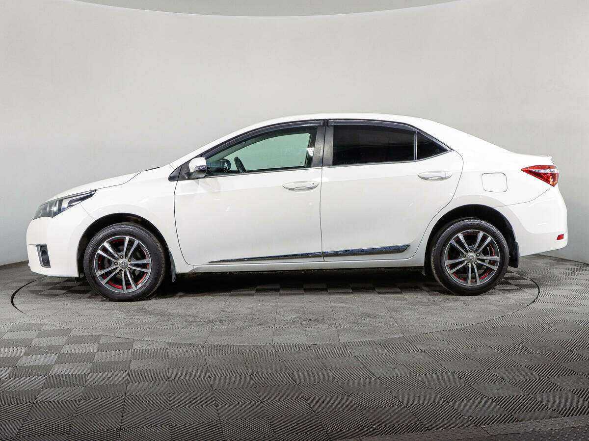 Б/У Тойота Королла 2014 года. Фото: #7