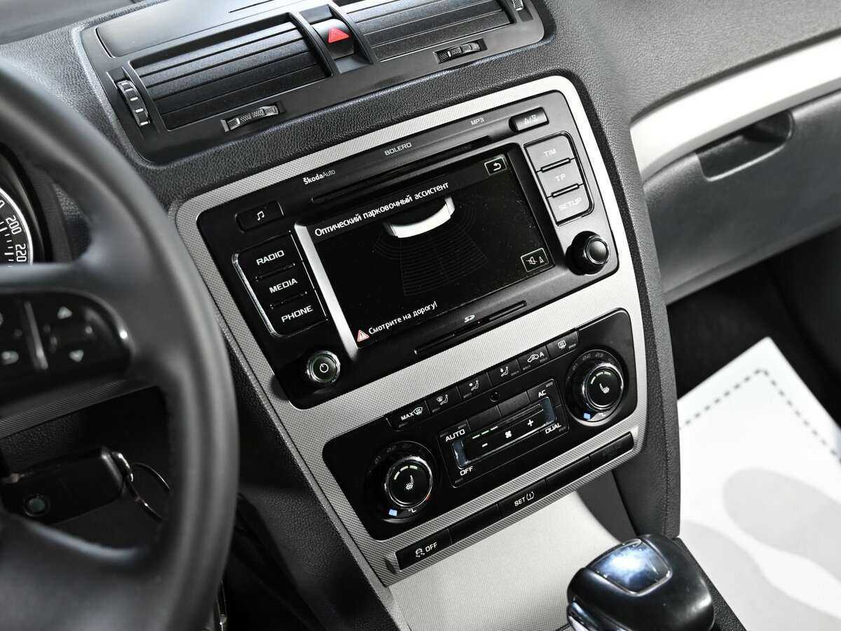 Б/У Шкода Октавия 2012 года. Фото: #9