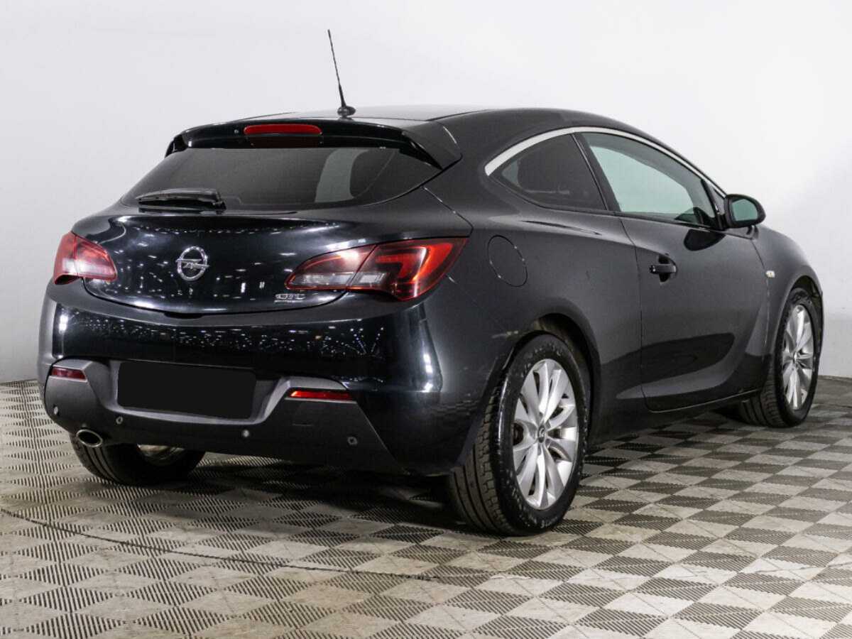 Б/У Опель Астра 2012 года. Фото: #4