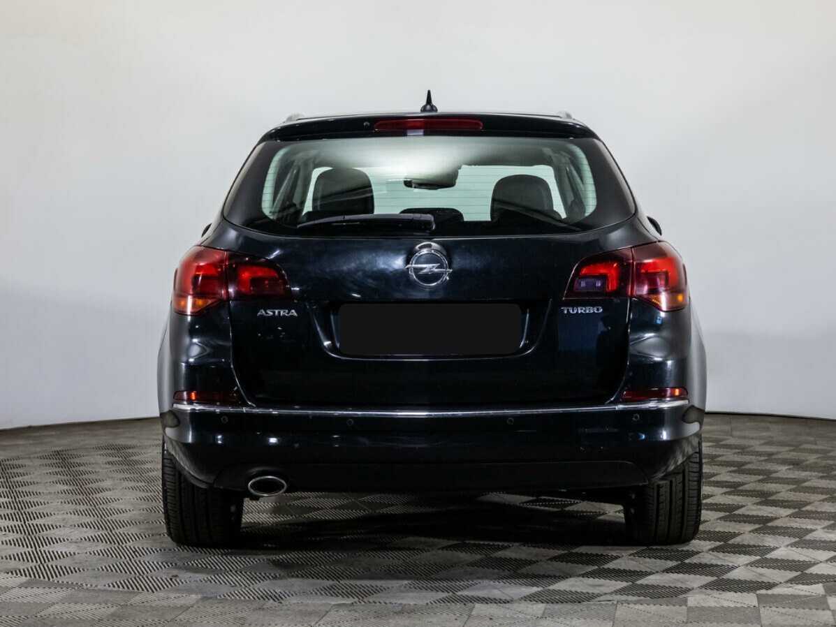 Б/У Опель Астра 2012 года. Фото: #4