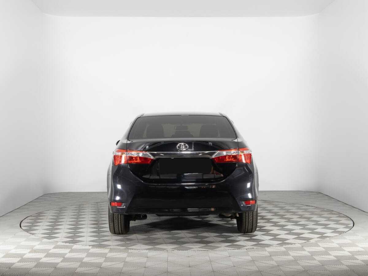 Б/У Тойота Королла 2014 года. Фото: #5