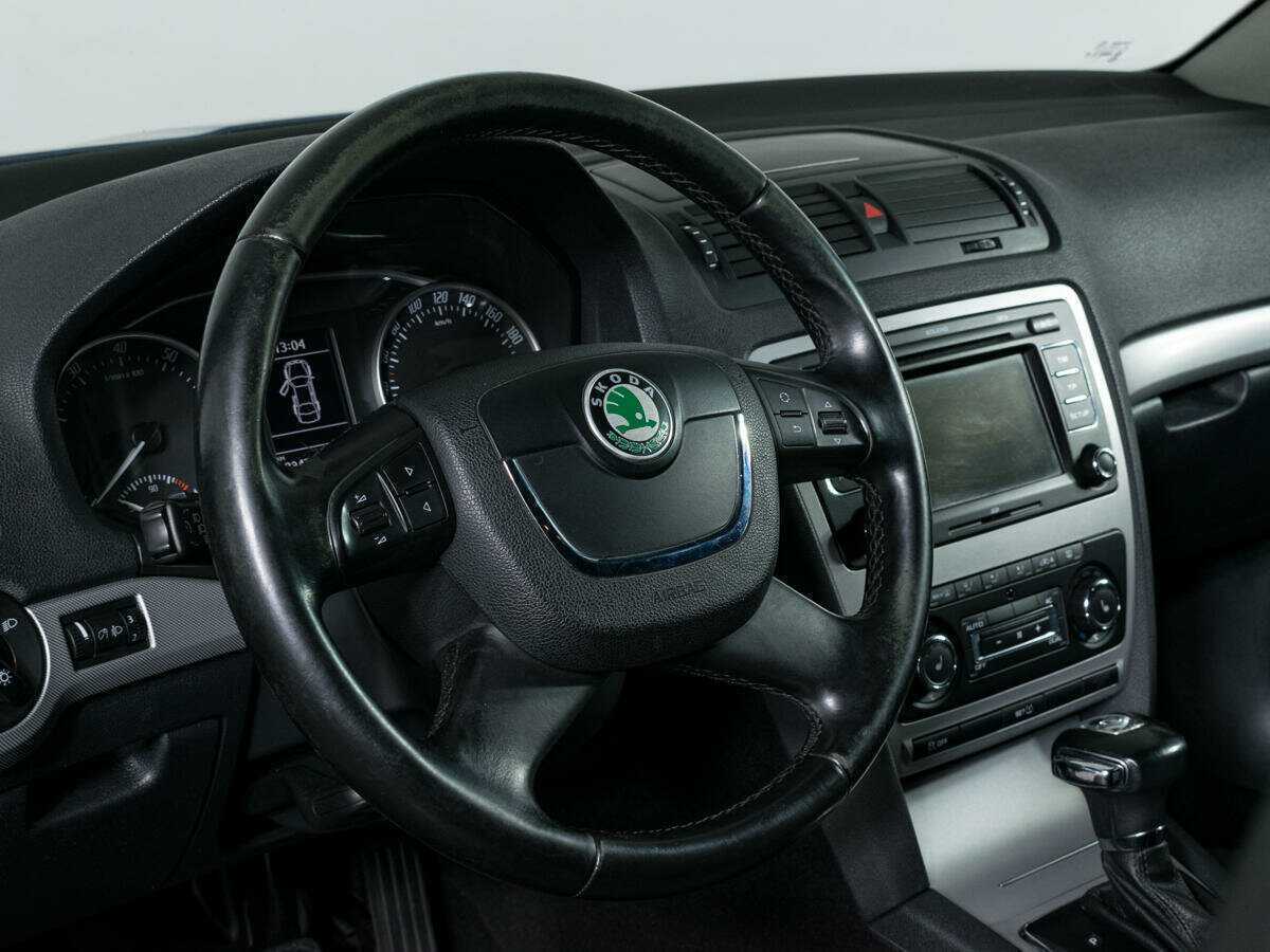 Б/У Шкода Октавия 2012 года. Фото: #13