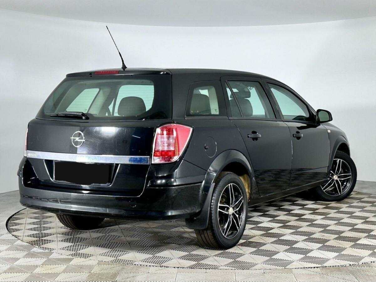 Б/У Опель Астра 2014 года. Фото: #1