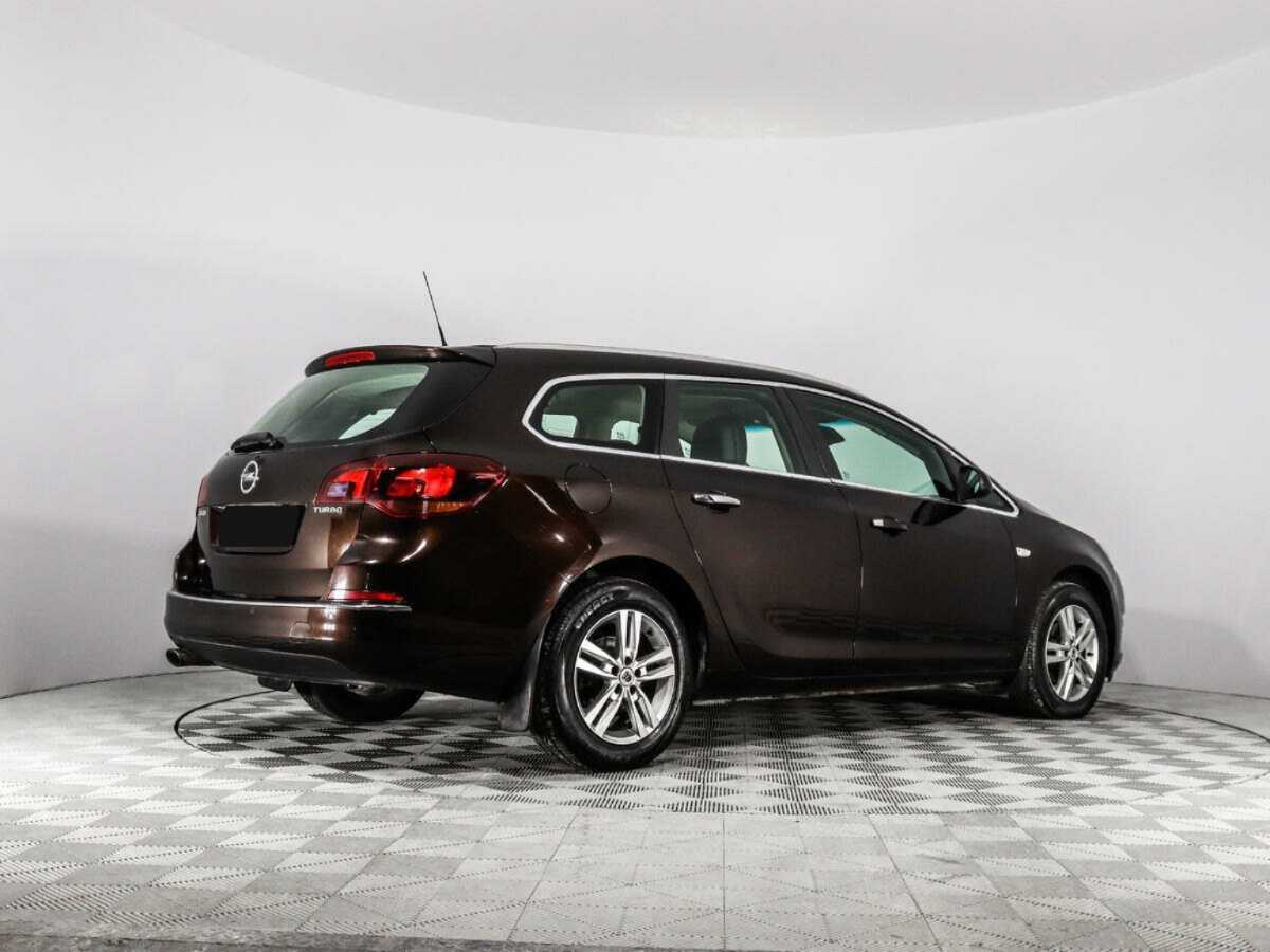 Б/У Опель Астра 2013 года. Фото: #4