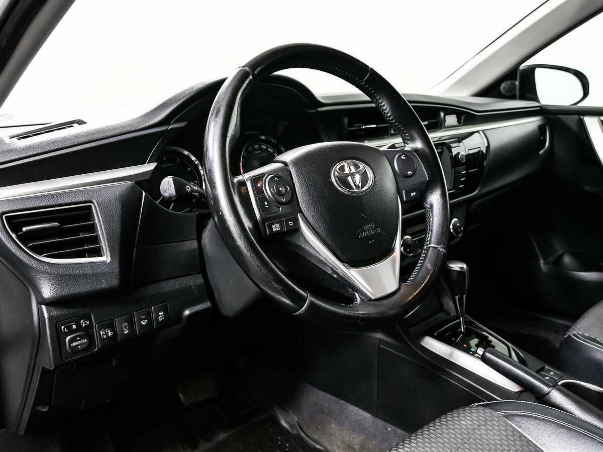 Б/У Тойота Королла 2013 года. Фото: #11