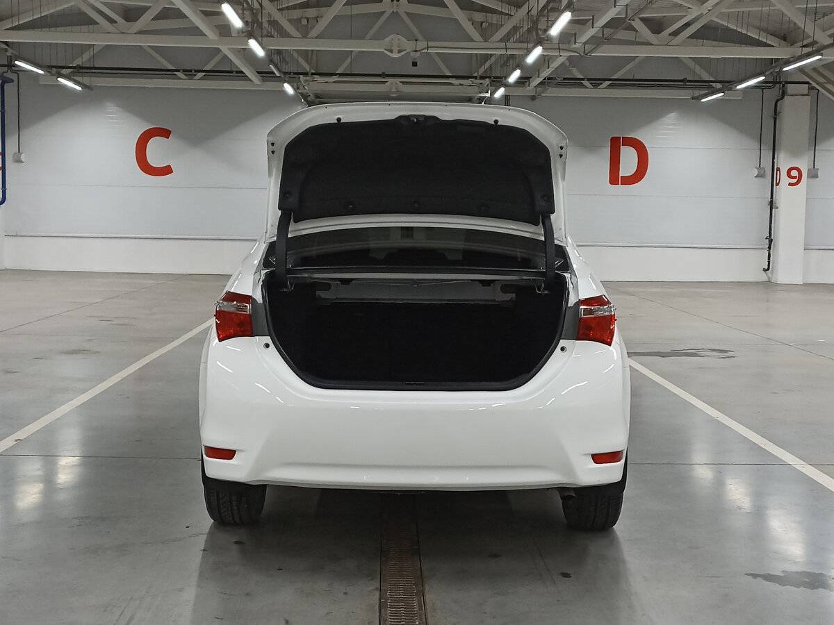 Б/У Тойота Королла 2013 года. Фото: #9