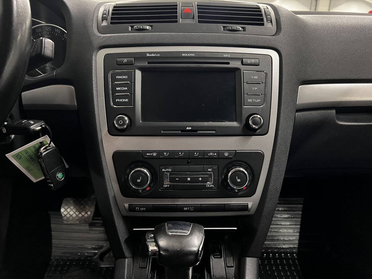 Б/У Шкода Октавия 2012 года. Фото: #13