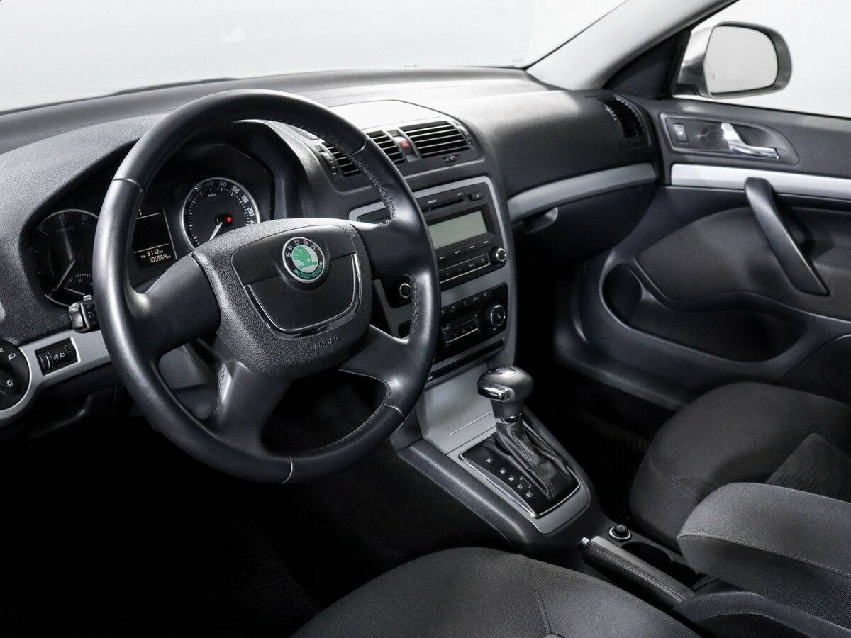 Б/У Шкода Октавия 2012 года. Фото: #11