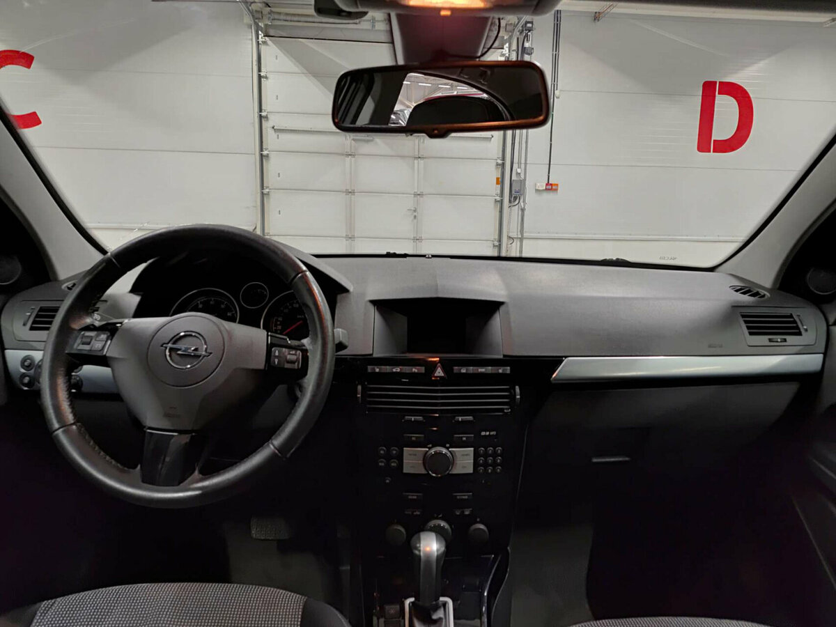 Б/У Опель Астра 2012 года. Фото: #13